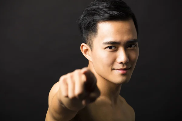 Attractive young man face finger pointing — Stock Photo, Image