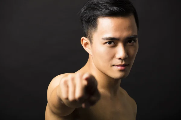 Attractive young man face finger pointing — Stock Photo, Image