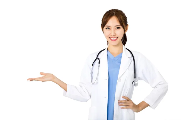 Friendly young female doctor with showing gesture — Stock Photo, Image