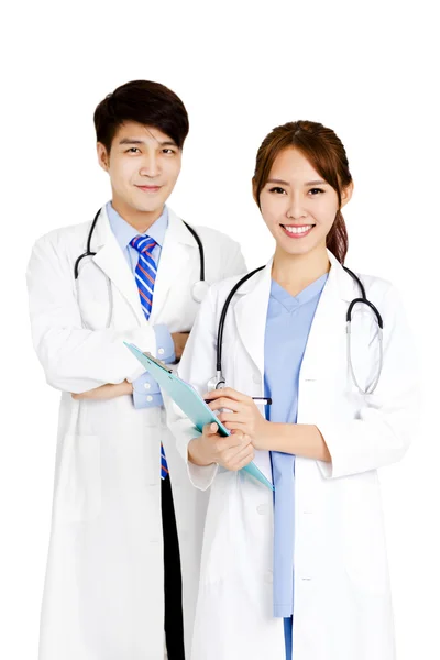 Confident male and female doctors standing together — Stock Photo, Image