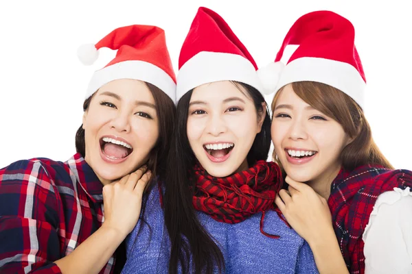 Glückliche junge Frauengruppe mit Weihnachtsmann — Stockfoto