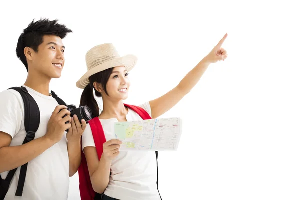 Glada turister par hålla karta och kamera Stockfoto