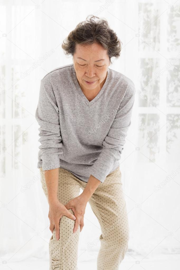 senior woman with  knee pain