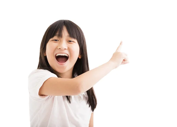 Happy little girl with pointing finger — Stock Photo, Image