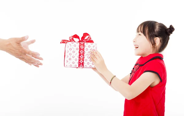 Happy chinese new year.little girl giving gift box — Stock Photo, Image