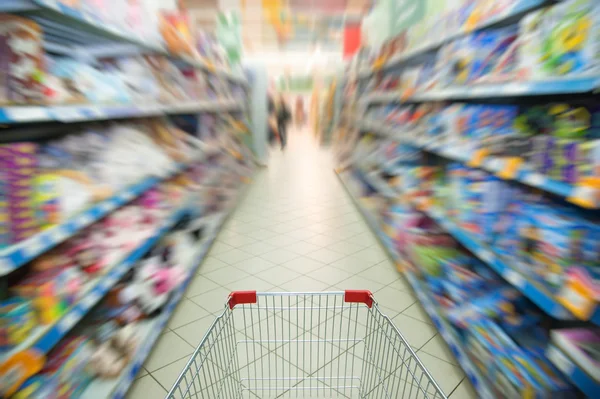 Supermarket aisle motion blur — Stock fotografie