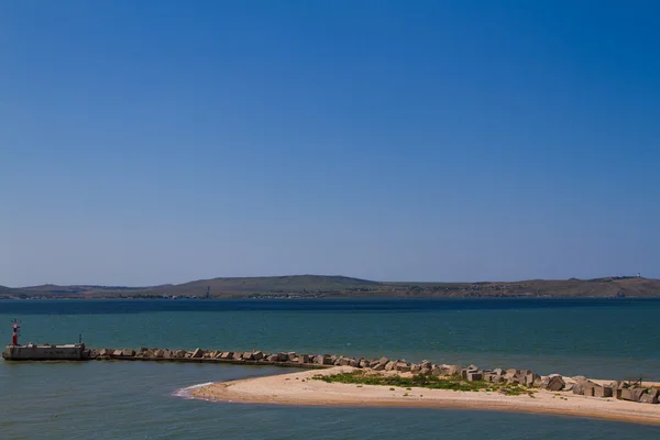 Molo di pietra in mare — Foto Stock