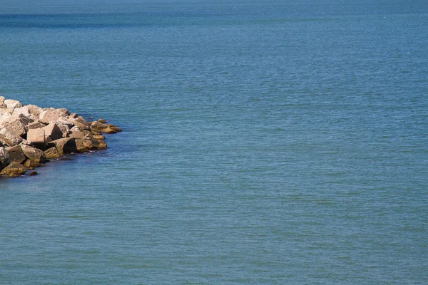 Stone pier into the sea — Stock Photo, Image