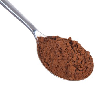 İzole bir kaşık kakao tozu