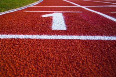 Kırmızı koşu sporu arka planı ve dokusu. Spor koşusu konsepti.