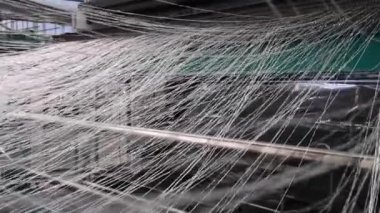 bir tekstil fabrikasında makine iplik Tekstil Sanayi - iplik biriktirir.
