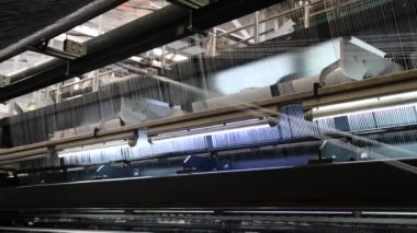 bir tekstil fabrikasında makine iplik Tekstil Sanayi - iplik biriktirir.