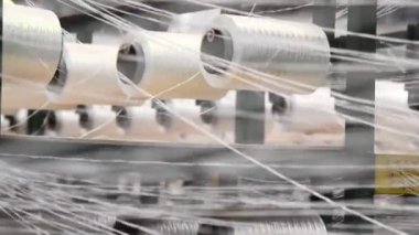 bir tekstil fabrikasında makine iplik Tekstil Sanayi - iplik biriktirir.