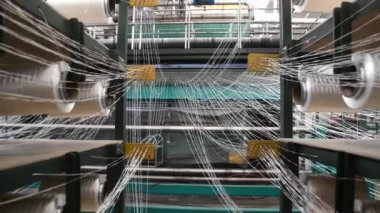 bir tekstil fabrikasında makine iplik Tekstil Sanayi - iplik biriktirir.