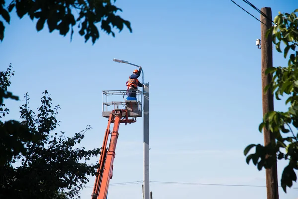 Worker Helmet Safety Protective Equipment Installs New Diode Lights Worker — Stock Photo, Image