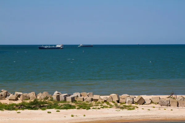 Molo di pietra in mare — Foto Stock