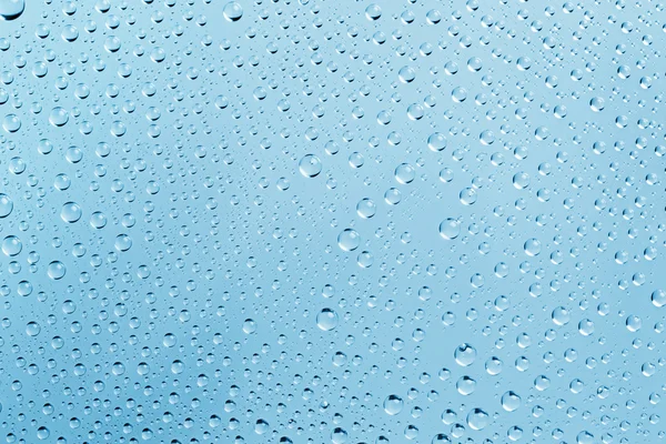 Abstracto gotas de agua Fondo azul claro — Foto de Stock