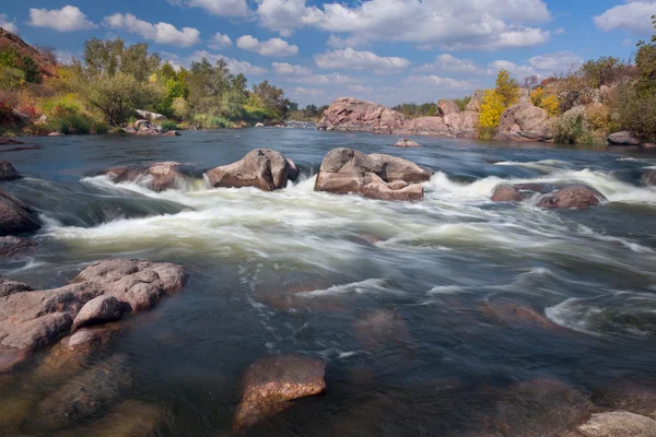 Beautiful sunny Autumn Day on The River with waterfall and big r — Stock Photo, Image