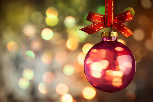 Christmas  bauble over Beautiful magic bokeh background — Stock Photo, Image