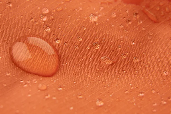 물으로 오렌지 방수 코팅 배경 삭제 — 스톡 사진