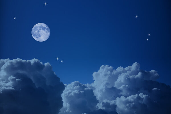 Fantastic view of Night Sky - Clouds, Stars and the Moon, background with copy space