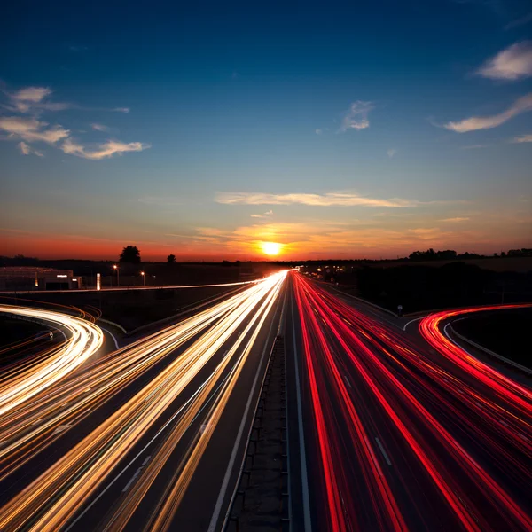 Speed Traffic  long exposure on motorway highway at sundown — Stock Photo, Image