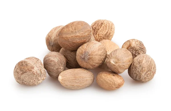 Nutmegs montón aislado — Foto de Stock