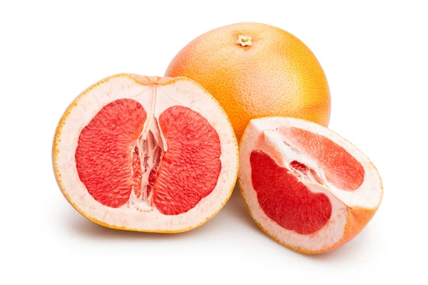 Whole and cut grapefruits — Stock Photo, Image