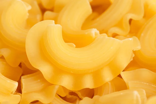 Bright uncooked pasta — Stock Photo, Image