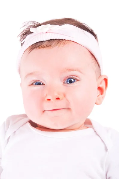 Όμορφο μωρό αστείο κορίτσι σε λευκό φόντο. — Φωτογραφία Αρχείου