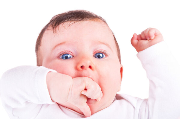 Beautiful funny baby girl on white background.