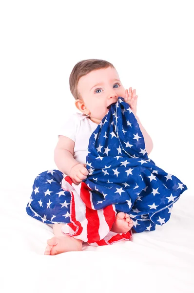 Babymeisje met Amerikaanse vlag. — Stockfoto