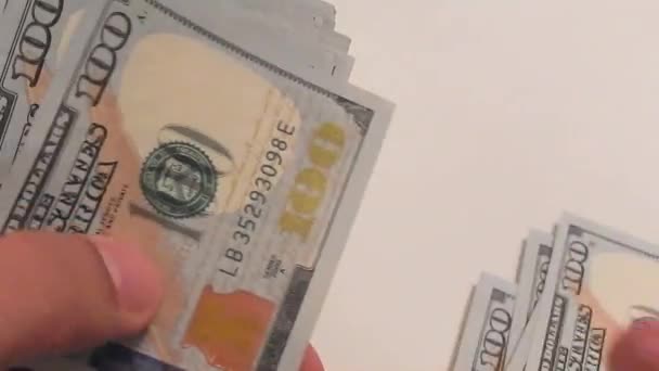 Counting a lot of one hundred dollar bills — Stock Video