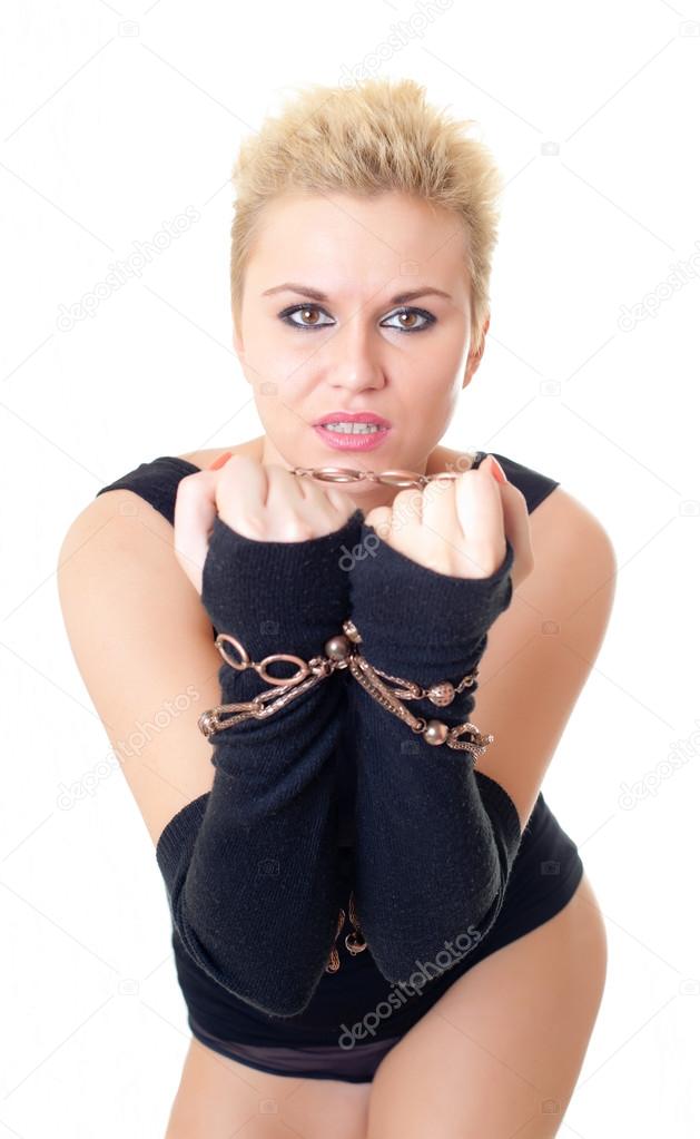 The attractive girl with a chain on hands