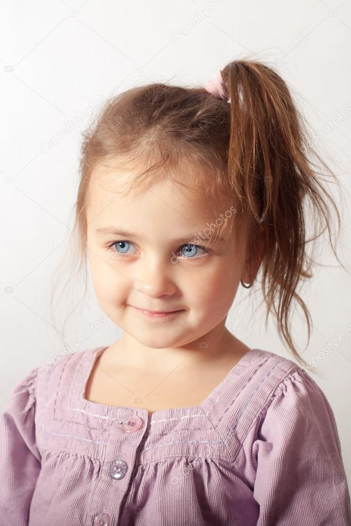 portrait of little blue-eyed girl
