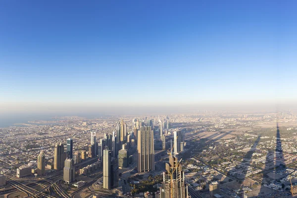 Aerial view of downtown in Dubai with blue sky — стокове фото