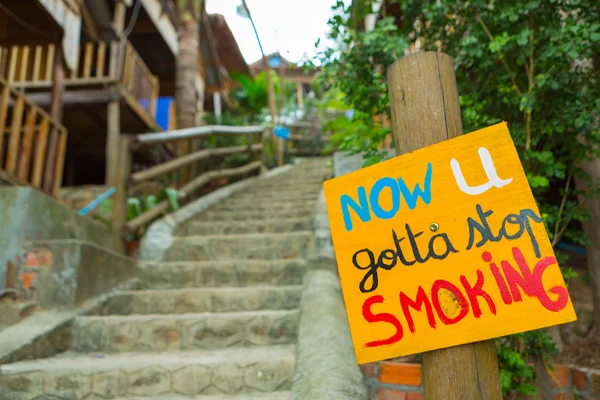 Quit Smoking placard with high stairs background, Cambodia — Stock Photo, Image