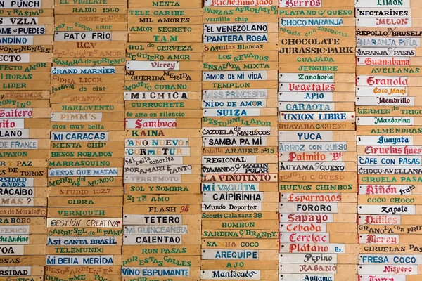 Old wooden board with all ice-cream names written in Spanish, Me — Stock Photo, Image