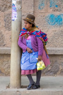 Old Aymara woman in Tupiza with traditional clothes, Bolivia clipart