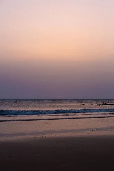 Puesta de sol en la playa de Legzira, Marruecos —  Fotos de Stock