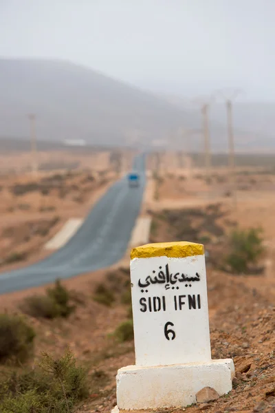 Famous white and yellow road sign, Morocco — Stock Photo, Image