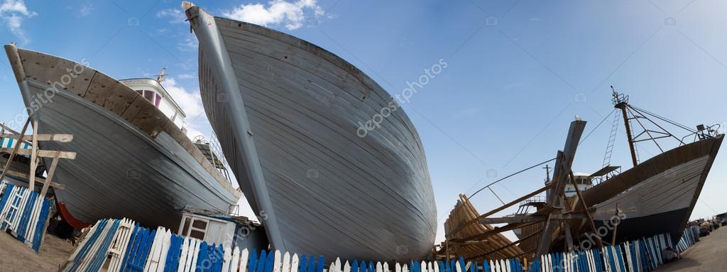 Wooden fishing boats under construction in shipyard, Morocco — Stock Image Wooden fishing boats under construction in shipyard, Morocco Royalty Free Stock Photos