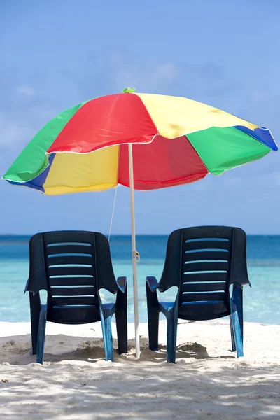 Two chairs and umbrella on tropical beach, venezuela — Stock Photo, Image