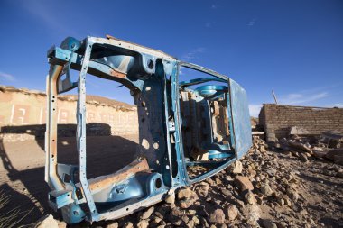 Rusted vehicle frame in the Altiplanos with morning light, Boliv