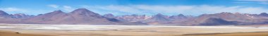 Mountains and salt pan in Eduardo Avaroa Reserve, Bolivia