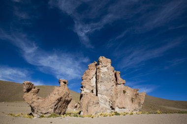 Rock formation with shape of a camel with blue sky, Bolivia