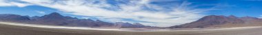 Mountains and salt pan in Eduardo Avaroa Reserve, Bolivia