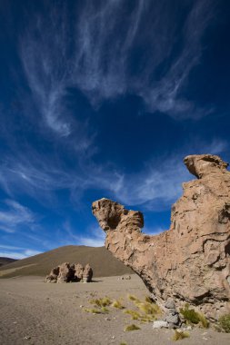 Rock formation with shape of a camel with blue sky, Bolivia