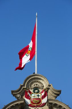Flag from Peru on top Of Presidential Palace in Lima, Peru