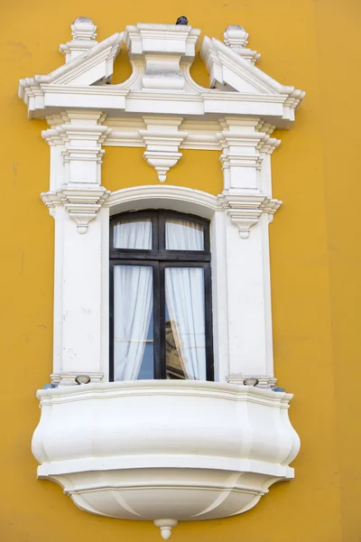 Colonial yellow and white balcony — Stok fotoğraf